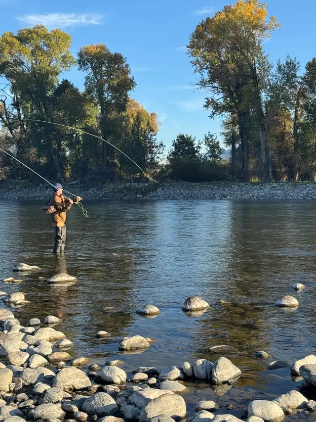Fly fishing on a quiet autumn river